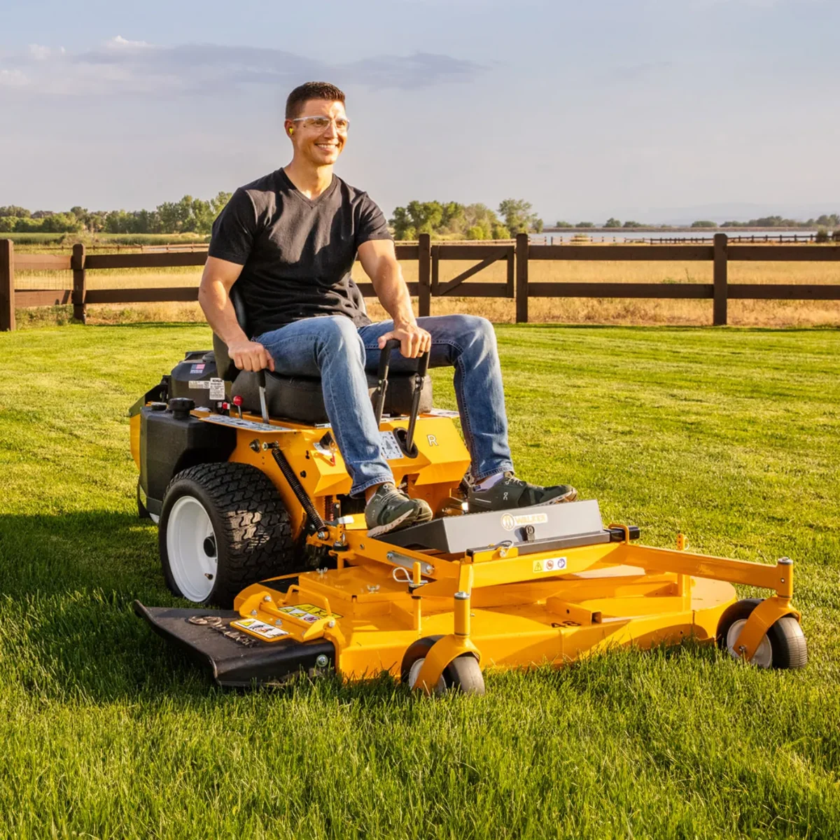 Walker mower on a rural lawn